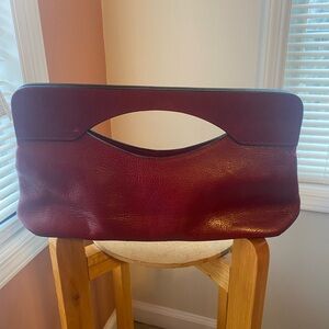 Vintage  Wilson’s Leather Pelle Studio red handled clutch